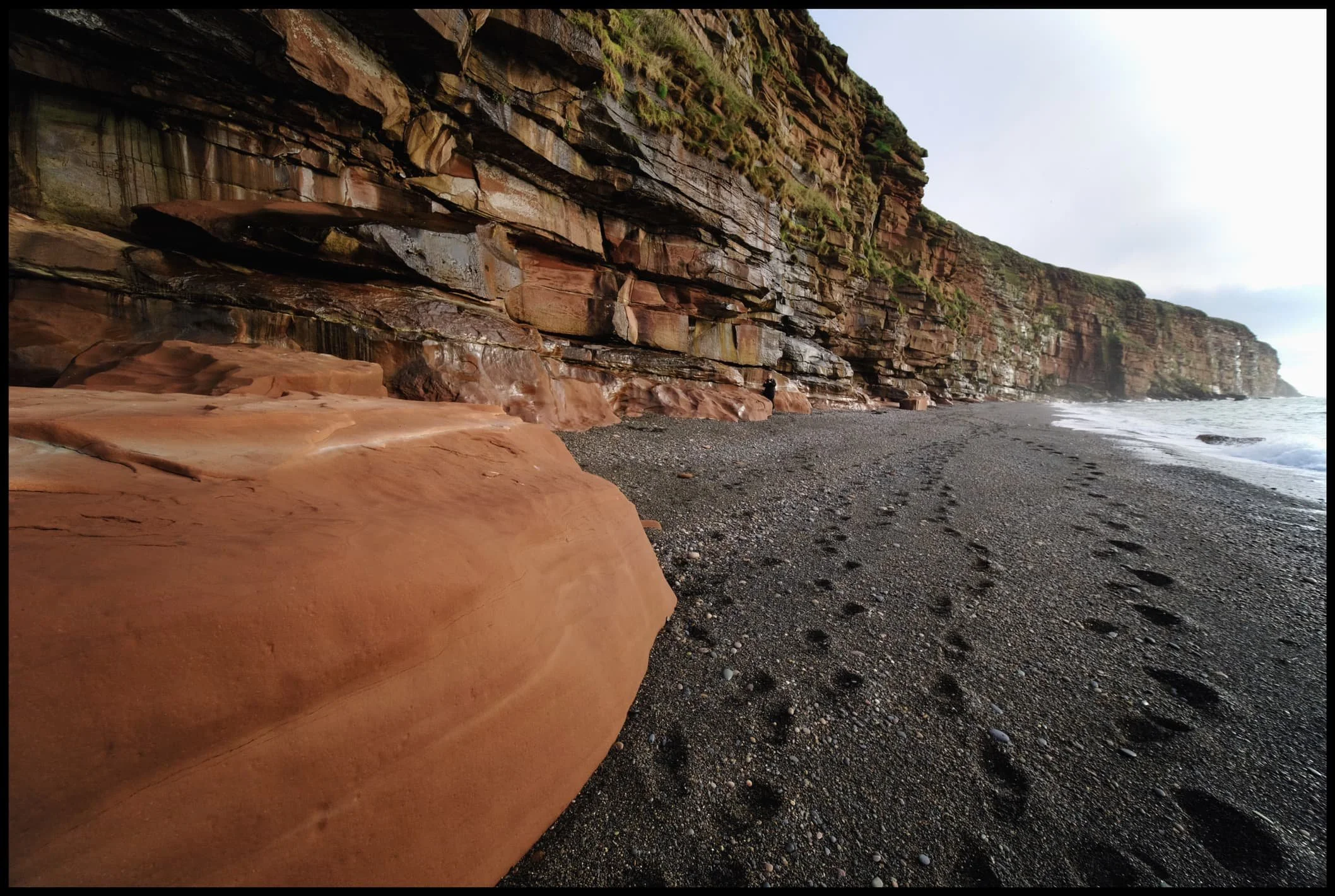  Our footprints are testament to how soft and deep the shingle goes. Really hard to walk in. We ventured as far out as we dared with the tide making its way in. 