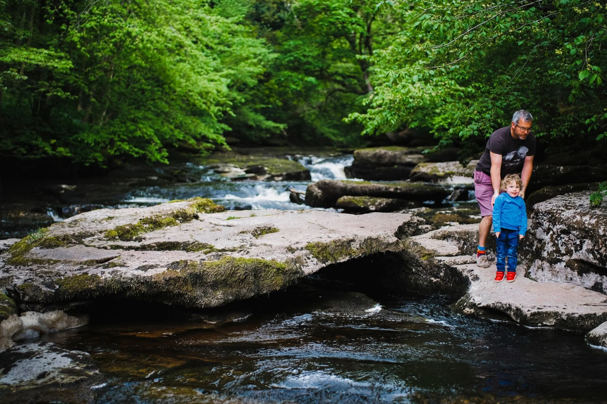 Making our way back to Stenkrith Park, the trail runs alongside the River Eden, which we had fun exploring. There’s loads of beautifully carved limestone and rushing cascades to photograph. This child was not happy that we were standing on “his” rock.
