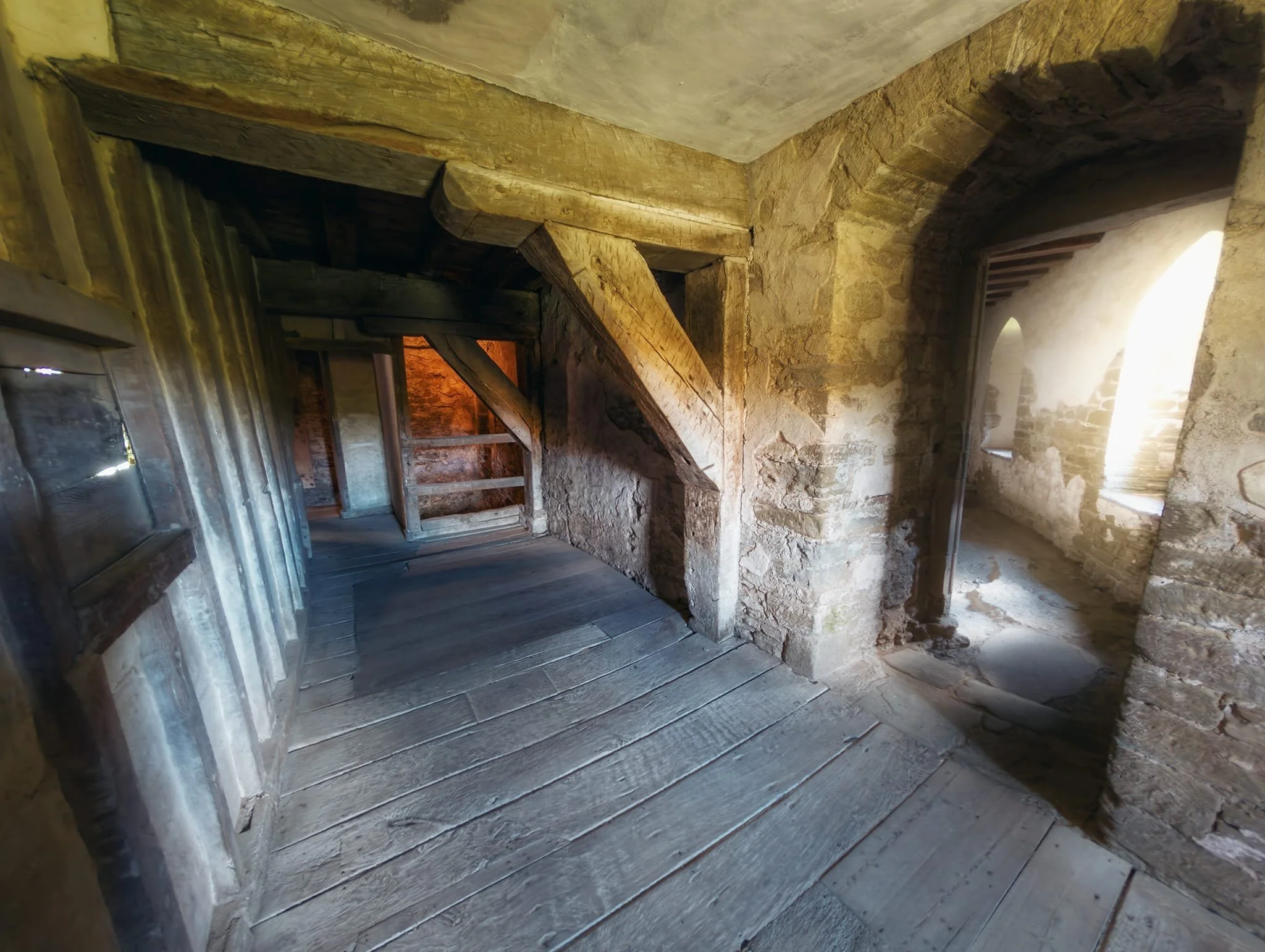  Ducking through the gatehouse (doorways were shorter back then), I head into the castle for a wander around its ancient rooms and hallways. This is the ground floor of the Solar Block, a two-story private apartment wing, originally built in the late 1280s and 1290s. 