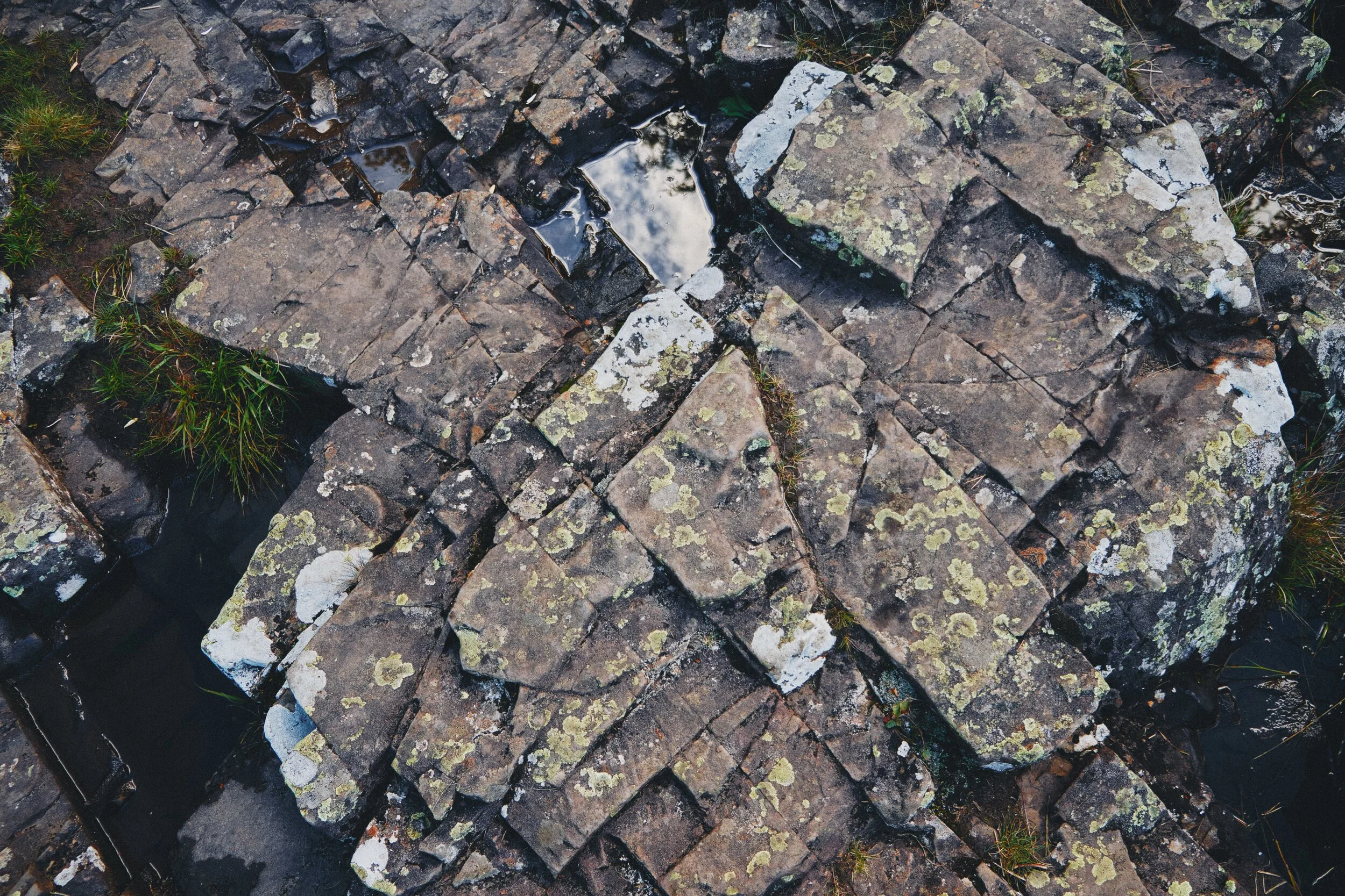  The rock here is Whin Sill, the exact same rock found at the head of High Cup Nick (you can read about our hike up to this  epic valley here ). The rock is extremely hard and resists erosion, forming columns and tessellating block pavements. 
