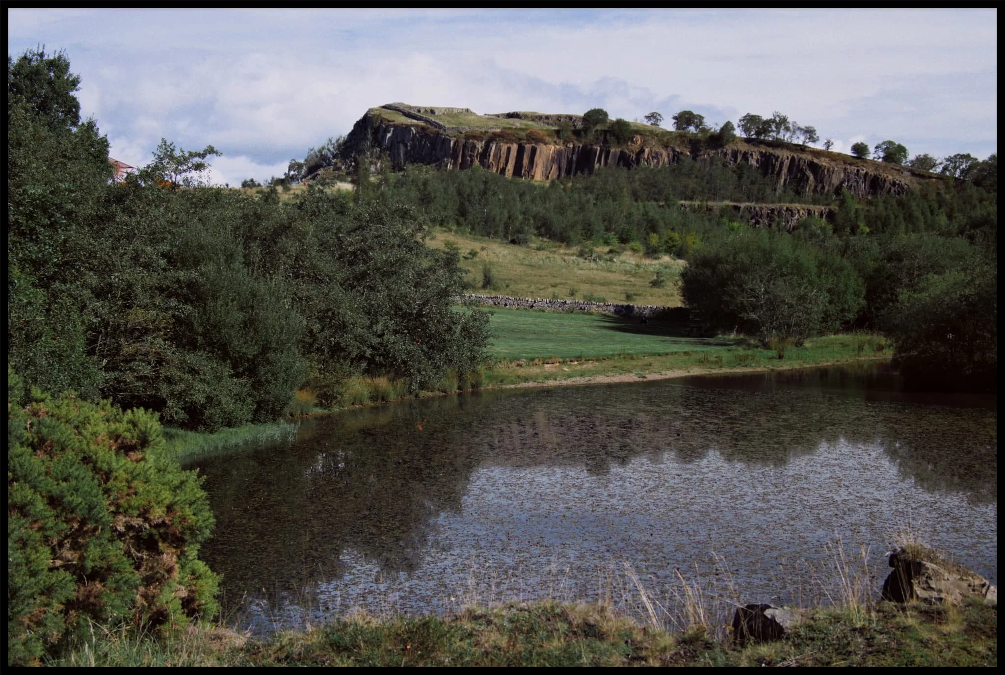  We rounded back on ourselves, this time taking the longer path towards Walltown Crags, pictured here high above the pond. Walltown Country Park was formerly a quarry until 1976, and has since been allowed to be reclaimed by nature. 