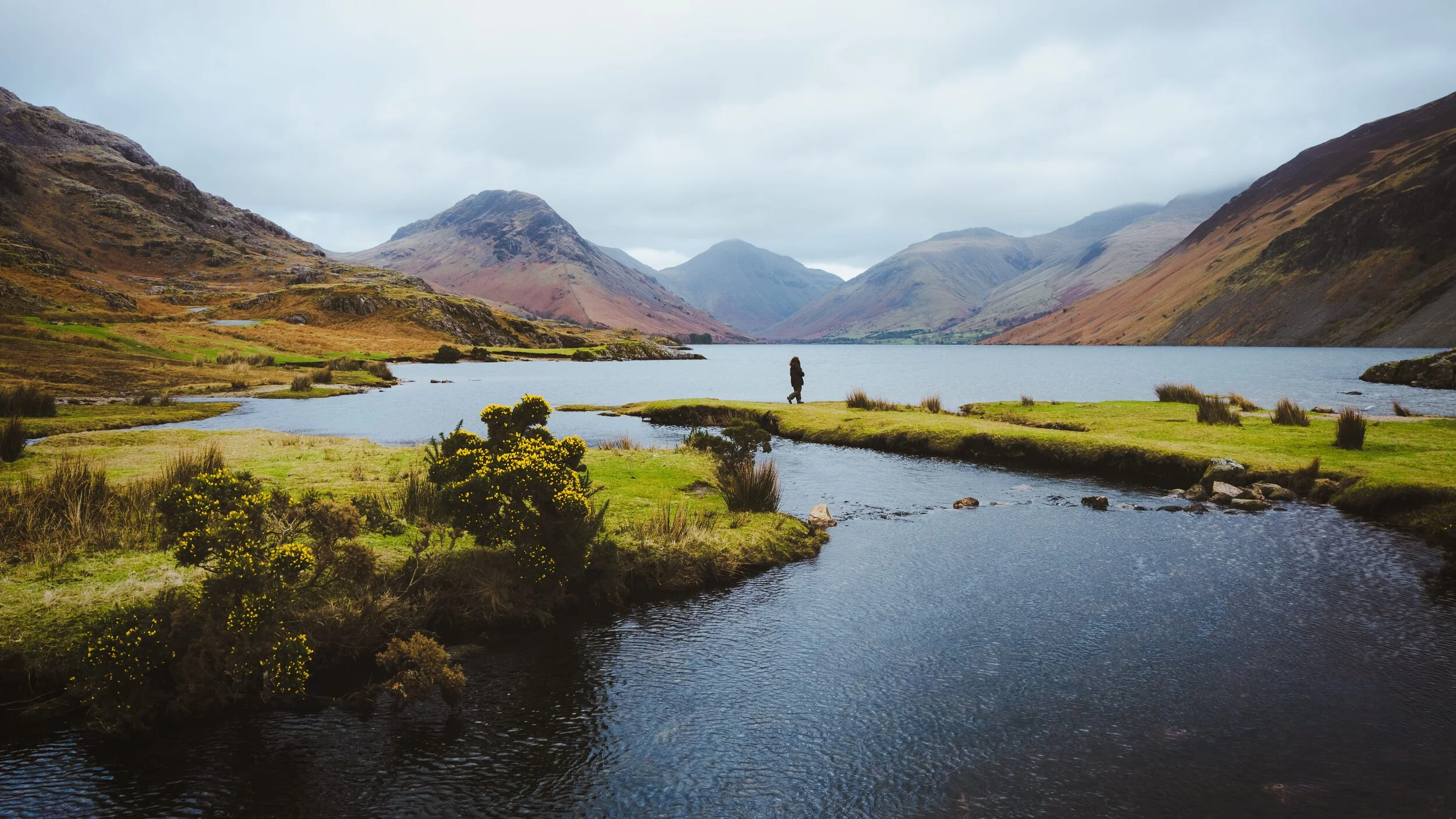 The View that was once voted Britain’s Favourite View, shot from roughly halfway along Wastwater’s northwestern shore, with my little Lisabet exploring the waters.