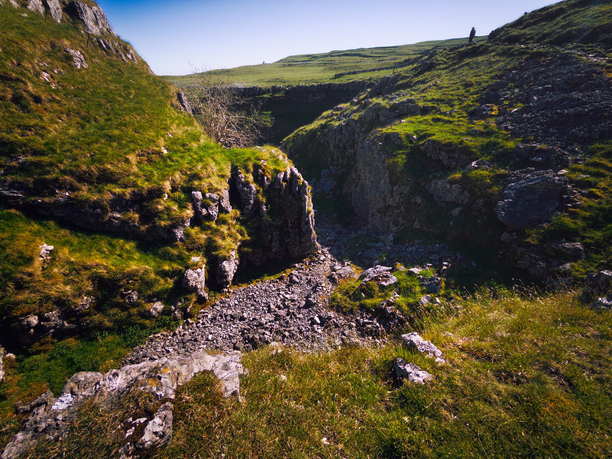An ultra-wide perspective shows where the river would&rsquo;ve crashed as a waterfall and twisted as it carved its way down the valley.