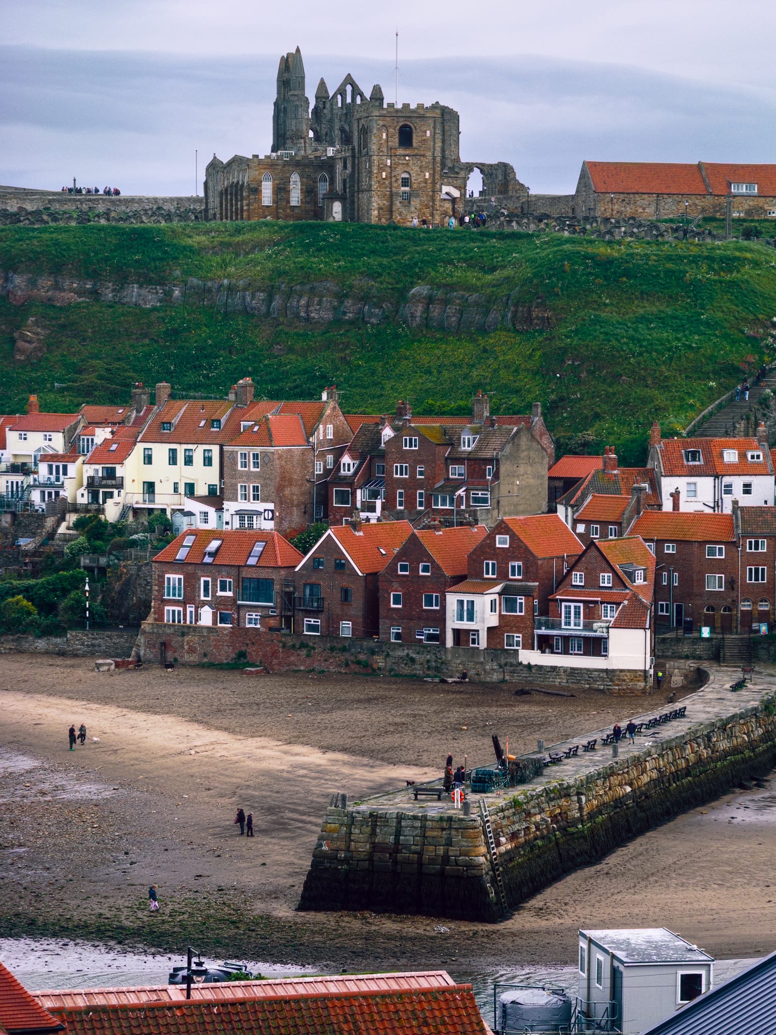 A tighter composition of the East Cliffs, showing off the older part of Whitby with the church and abbey commanding a presence above.