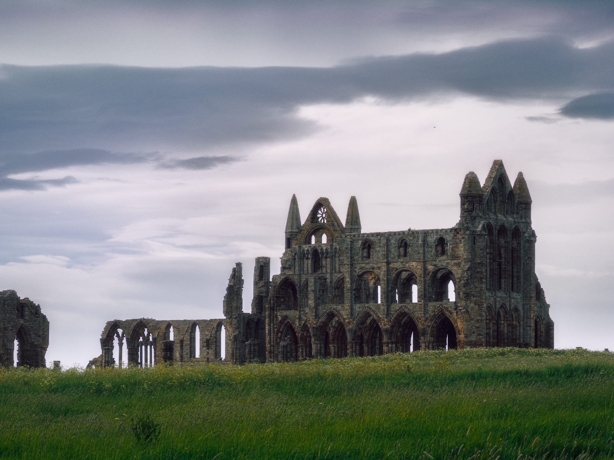 The majestic ruins of Whitby Abbey. A Benedictine abbey, built after the original monastery was burnt down by the Vikings, it was dedicated to Lady Hilda, the original monastery&rsquo;s founder and first abbess. As with a lot abbeys in England, it was destroyed by Henry VIII in 1540 during the Dissolution of the Monasteries.