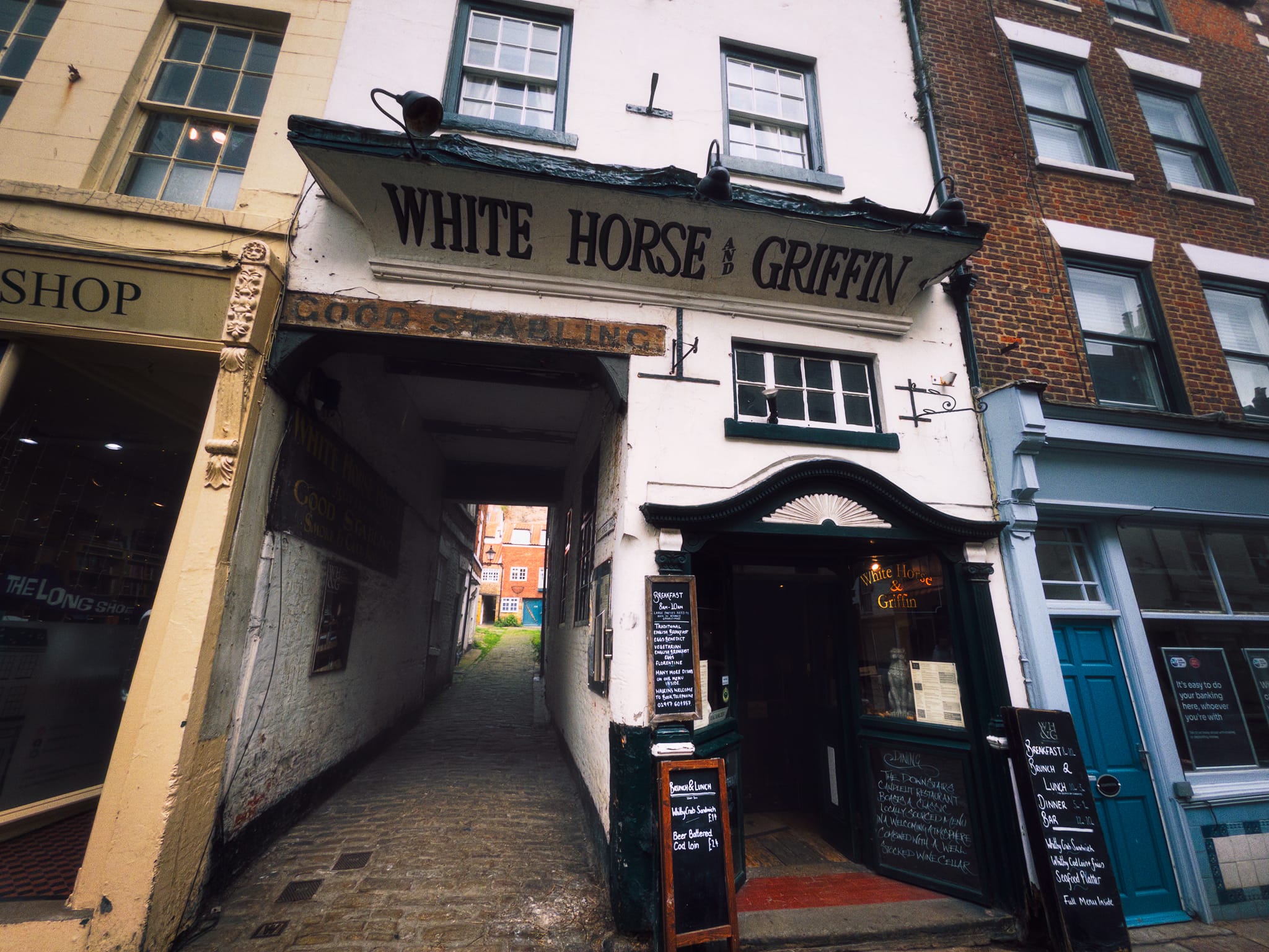 Whitby is full of historical gems (ah-ha!) like this. This is the White Horse & Griffin. Built in 1681 by Sir Hugh Cholmley, this property served as the very first coaching inn running between Whitby, York, and London. Renowned maritime explorers Captain James Cook and William Scoresby used the tavern as a hub to interview, hire, and assemble their ship crews. Charles Dickens visited the establishment and wrote about its unique layout, specifically mentioning the &ldquo;oyster-shell grottoes&rdquo; located in the back yard.