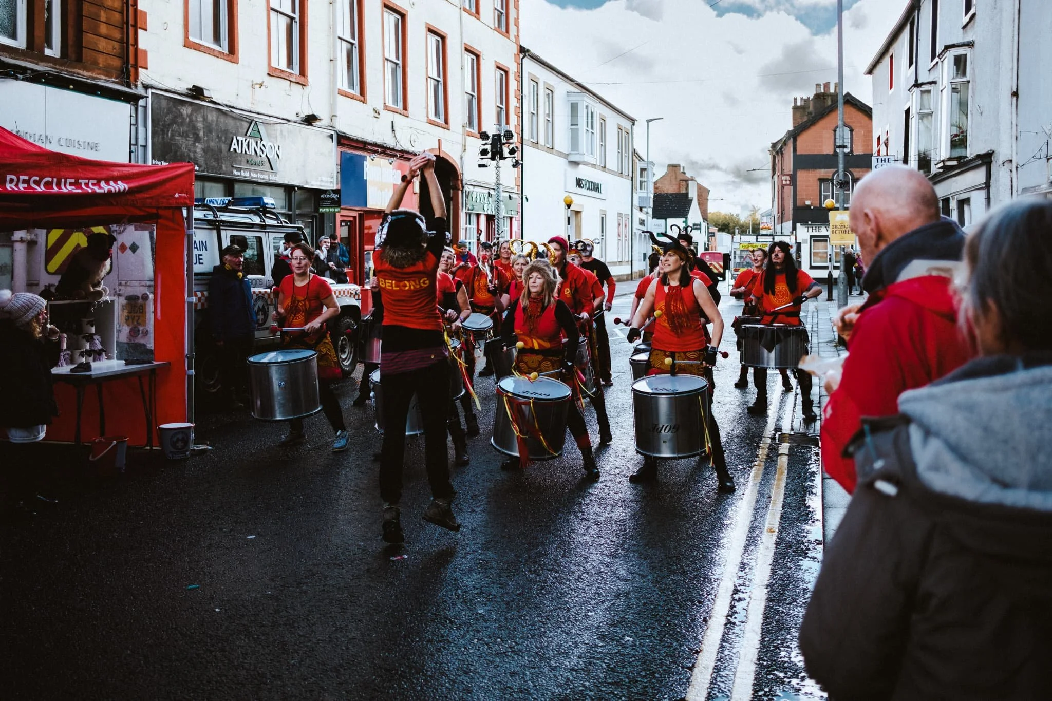  Back outside we followed the booming and crackling sounds of drums. 