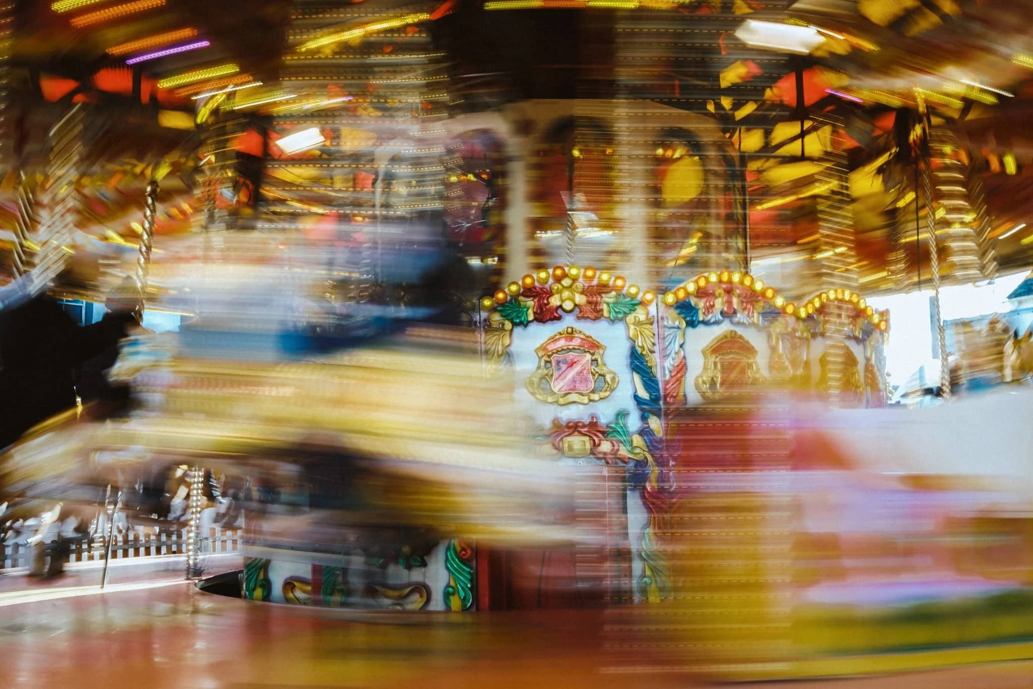  Back in the town centre, all the fairground rides were in regular use and full swing as the sun was beginning its trajectory below the horizon. I wanted to see if I could get some motion blur shots of the Galloping Horse carousel. Didn&rsquo;t turn out too bad! 