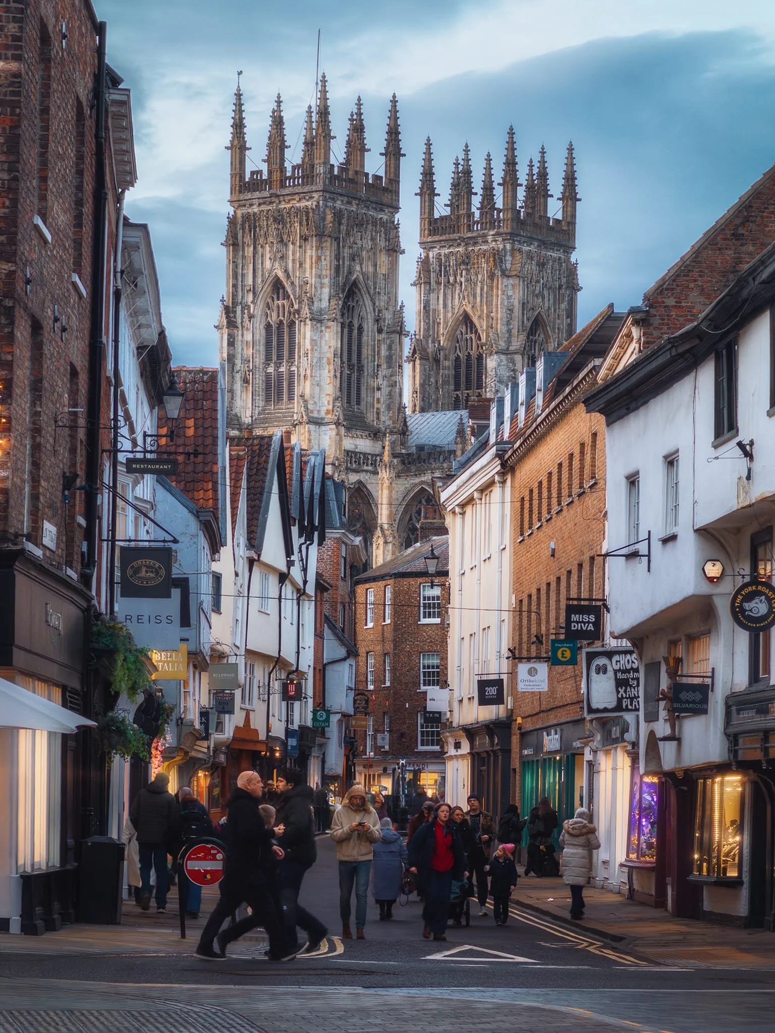  An incredible view, and one of York&rsquo;s most famous, looking up Low Petergate towards the majestic towers of York Minster. 